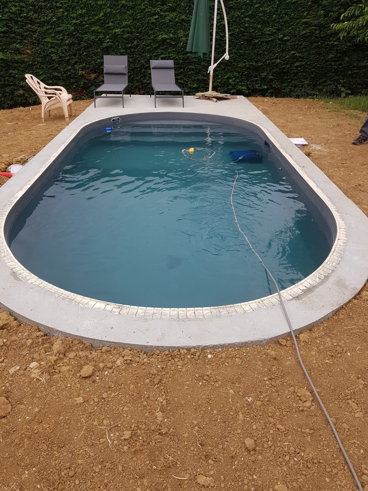 Réalisation d'une piscine forme hawaï de 7m x 3m pour une maison neuve sur Lentilly